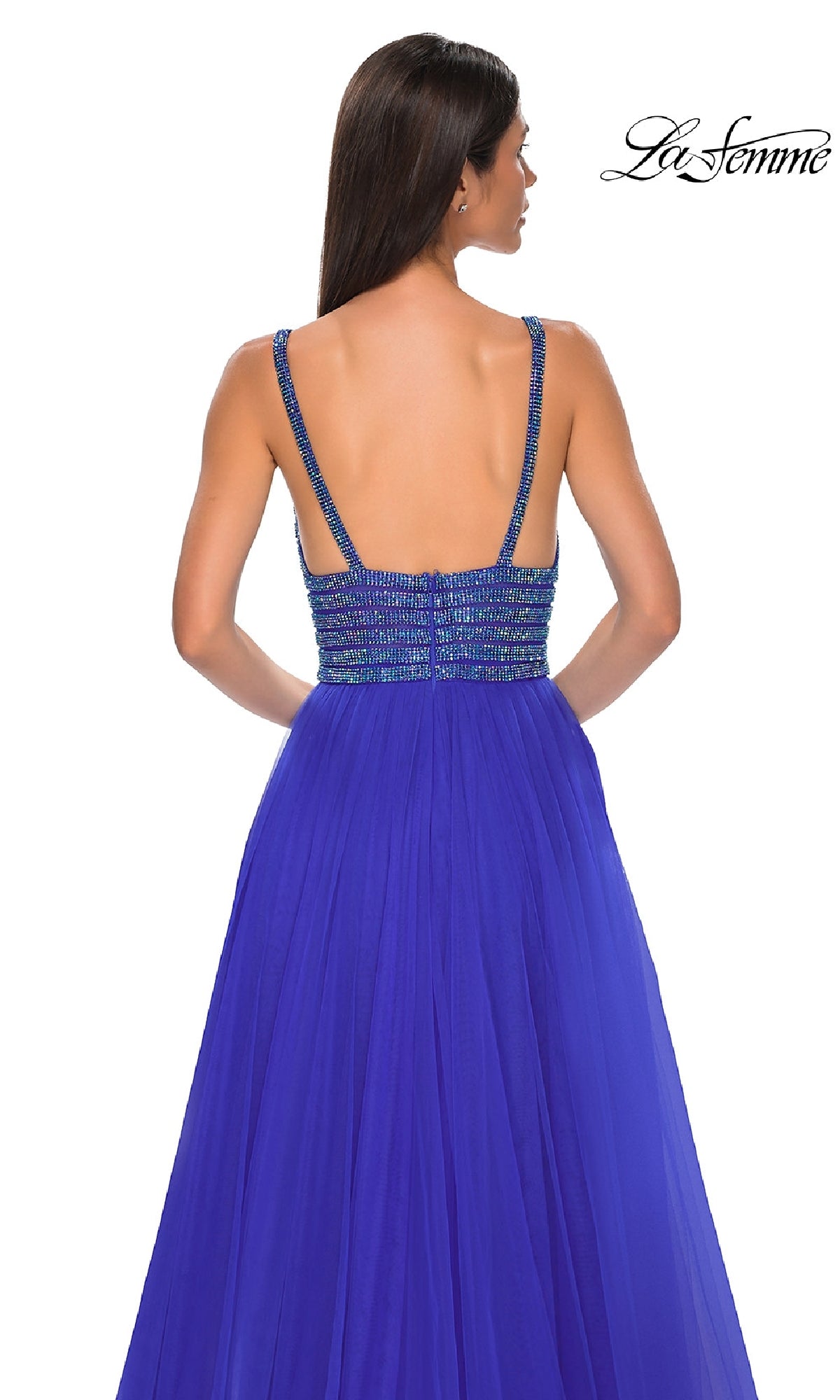A woman shown from the back wears the La Femme 32714 Rhinestone-Bodice Prom Ball Gown—a sleeveless, floor-length royal blue A-line dress with thin straps and a rhinestone-beaded bodice.